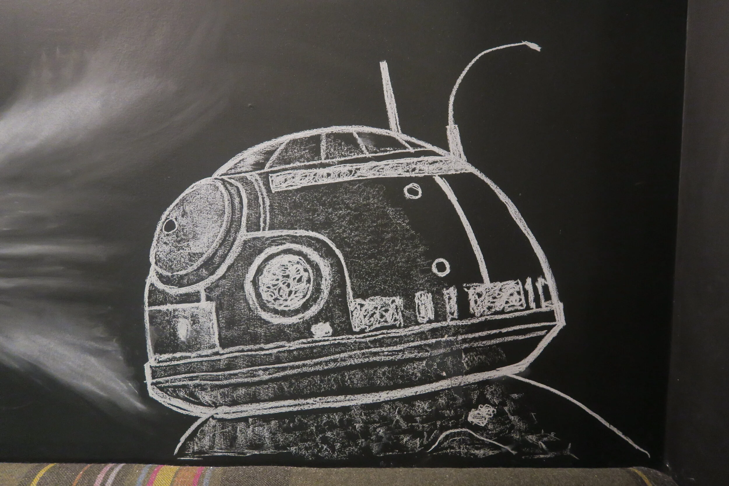 Chalk art mural detail with illustrated food elements