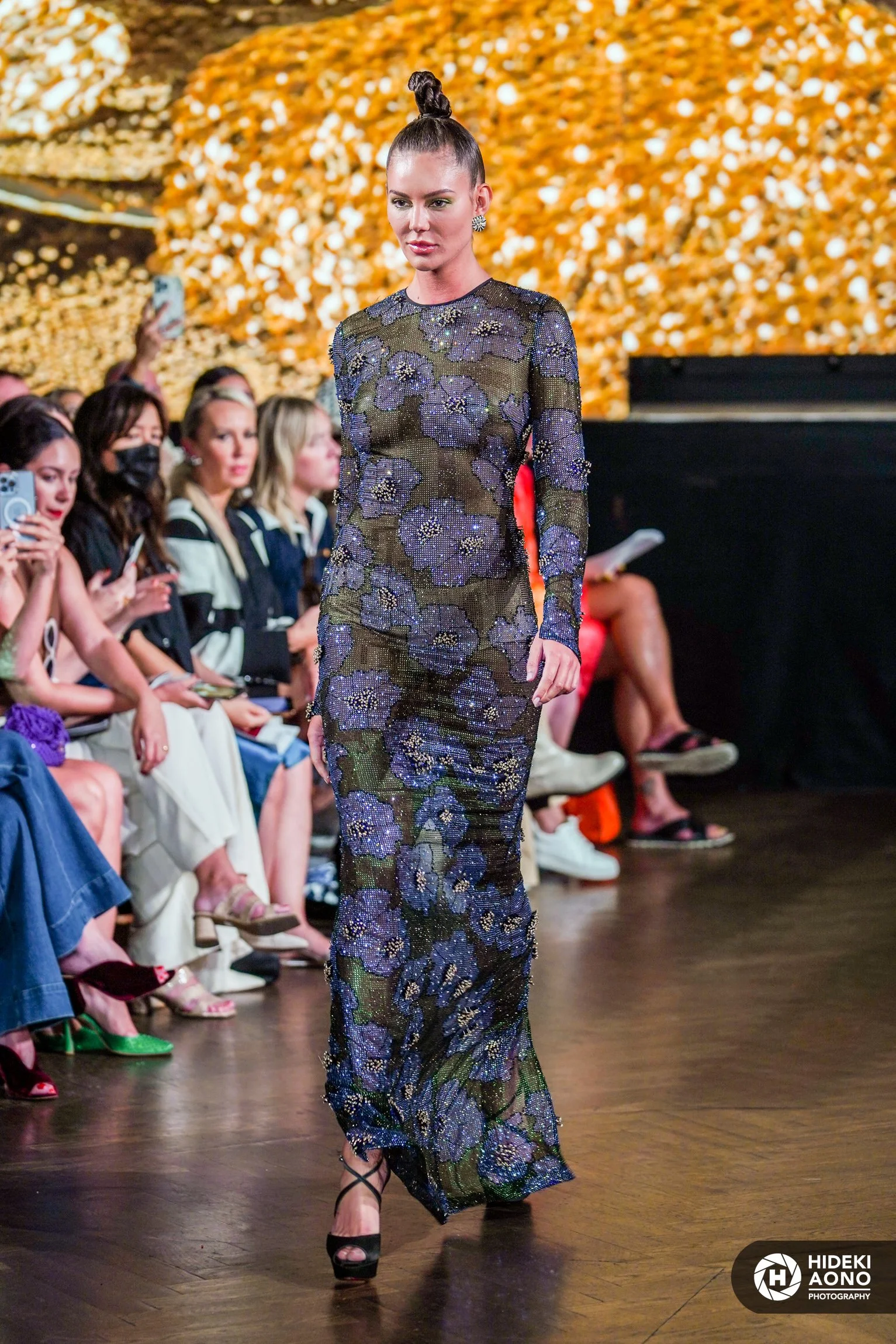 Runway photography with patterned garment detail